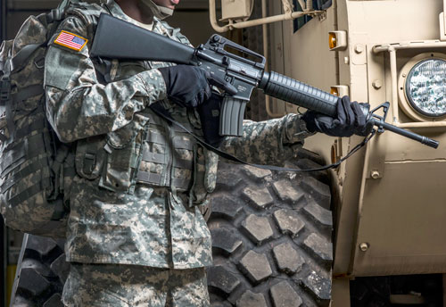 American Army soldier detail with M16 in hand